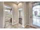 Hallway with access to a bathroom with shower and a living space at 8560 Osmerea Ct, Las Vegas, NV 89149