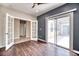 Spacious living room featuring French doors and a sliding door leading to a patio at 8560 Osmerea Ct, Las Vegas, NV 89149