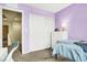 Bright bedroom showcasing a bed, window, and desk, all in a cozy and comfortable setting at 9236 Keystone Ridge Ave, Las Vegas, NV 89148