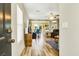 Warm entryway with wood-look tile flooring, offering a glimpse into the open-concept living spaces at 9236 Keystone Ridge Ave, Las Vegas, NV 89148