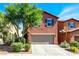 Charming two-story home featuring a well-maintained front yard, a driveway, and a two-car garage at 9236 Keystone Ridge Ave, Las Vegas, NV 89148