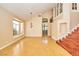 Bright living room featuring large windows, hardwood floors, and high ceilings at 9413 Cedar Heights Ave, Las Vegas, NV 89134