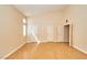 Large bedroom with neutral tones, beautiful hardwood floors, and natural light at 9413 Cedar Heights Ave, Las Vegas, NV 89134