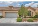 Charming single-story home featuring a well-maintained yard and a two-car garage at 9622 Emeraude Ave, Las Vegas, NV 89147