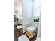 Bright bathroom with updated fixtures, wood-look flooring, and a comfort-height toilet at 9934 Iron Creek Ave, Las Vegas, NV 89178