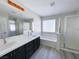 Elegant bathroom with dual sinks, tub, and stylish finishes at , Las Vegas, NV 89148