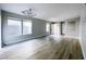 Open concept living room with lots of light and wood look floors at , Las Vegas, NV 89148