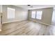 Spacious living room with lots of light and wood look floors at , Las Vegas, NV 89148
