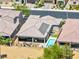 This beautiful backyard features a pool, covered patio, and outdoor seating, perfect for relaxing and entertaining at 1129 Via Della Curia, Henderson, NV 89011
