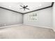 Light-filled main bedroom with plantation shutters and plush carpeting at 1129 Via Della Curia, Henderson, NV 89011
