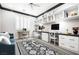 Spacious office area with custom built-ins, workstations, and a comfortable seating area at 1129 Via Della Curia, Henderson, NV 89011