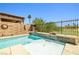Beautiful backyard pool with decorative water features offers a tranquil retreat at 1129 Via Della Curia, Henderson, NV 89011