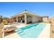 Inviting backyard pool and spa, perfect for outdoor entertaining and relaxation at 1129 Via Della Curia, Henderson, NV 89011