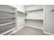 Walk-in closet with built-in shelving and plenty of room for storage at 1129 Via Della Curia, Henderson, NV 89011