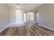 Inviting foyer with new wood flooring leading to the main living areas in neutral paint at 1195 Golf Club Dr, Laughlin, NV 89029