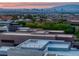 Stunning aerial view of a modern home with city skyline views at 1337 Villa Barolo Ave, Henderson, NV 89052