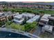 Stunning aerial view of a modern home showcasing its architecture, landscaping, and surrounding neighborhood at 1337 Villa Barolo Ave, Henderson, NV 89052