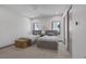 Bright bedroom featuring two twin beds, modern decor, and plenty of natural light at 1337 Villa Barolo Ave, Henderson, NV 89052