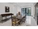 Elegant dining room featuring a large table and chairs, perfect for entertaining guests at 1337 Villa Barolo Ave, Henderson, NV 89052