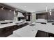 Beautiful kitchen featuring granite countertops, custom cabinets, stainless appliances, and modern fixtures at 1337 Villa Barolo Ave, Henderson, NV 89052