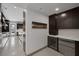 Modern kitchen with stainless steel appliances and dark cabinetry, offering style and functionality at 1337 Villa Barolo Ave, Henderson, NV 89052