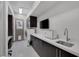 Well-equipped laundry room with modern appliances, ample counter space, storage cabinets, and a sleek design at 1337 Villa Barolo Ave, Henderson, NV 89052