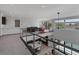 Loft features a lounge area overlooking a lower level, offering views of a golf course at 1337 Villa Barolo Ave, Henderson, NV 89052