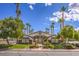 Community clubhouse surrounded by lush trees and landscaping for residents' enjoyment at 201 Teller St, Henderson, NV 89074