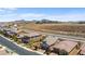 An aerial view of a residential area showcasing the neatly lined homes and mountain views at 2207 Valdina St, Henderson, NV 89044
