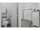 Neutral bathroom featuring a toilet, vanity, and glass-enclosed shower at 2207 Valdina St, Henderson, NV 89044
