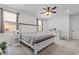 Bright bedroom with a large bed, stylish furniture, and neutral color palette at 2207 Valdina St, Henderson, NV 89044