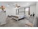 Well-lit bedroom featuring neutral decor, plush carpeting, and comfortable furnishings at 2207 Valdina St, Henderson, NV 89044