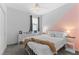 Cozy bedroom featuring a comfortable bed and charming decor, creating a serene atmosphere at 2207 Valdina St, Henderson, NV 89044
