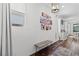 Bright hallway with modern lighting and a view into the adjacent living spaces at 2207 Valdina St, Henderson, NV 89044