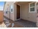 View of a home's front entrance with a stylish door and stone accents at 2207 Valdina St, Henderson, NV 89044