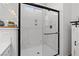 Clean, bright shower showcasing marble-like walls, and a sleek glass door at 2207 Valdina St, Henderson, NV 89044