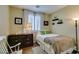 Cozy bedroom with a plush bed, dresser, and decor at 2418 Brockton Way, Henderson, NV 89074