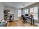 Bright office space with hardwood floors, natural light, and desk setup at 2418 Brockton Way, Henderson, NV 89074