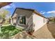 A home's exterior view showcasing a well-manicured lawn and low-maintenance landscaping for a serene outdoor living experience at 2537 Nashira St, Henderson, NV 89044