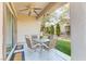 Inviting outdoor patio featuring a ceiling fan and comfortable seating, perfect for relaxing and enjoying the backyard view at 2537 Nashira St, Henderson, NV 89044
