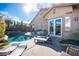 Outdoor space featuring a pool, built-in BBQ, and outdoor furniture perfect for relaxation and entertainment at 340 Autumn Palace Ct, Las Vegas, NV 89144
