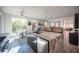 Spacious kitchen with an island, stainless steel appliances, and a breakfast nook with views of the backyard at 340 Autumn Palace Ct, Las Vegas, NV 89144