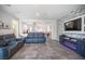 Open living area boasts modern furnishings, neutral decor, and seamless access to other living spaces at 340 Autumn Palace Ct, Las Vegas, NV 89144