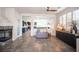 Inviting living space shows fireplace, modern furnishings, and seamless flow to other living areas at 340 Autumn Palace Ct, Las Vegas, NV 89144