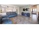 Spacious living area shows the brick accent wall, fireplace, and an open floor plan at 340 Autumn Palace Ct, Las Vegas, NV 89144