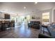 Open living space with kitchen views provides a comfortable seating area, adjacent to dining area at 340 Autumn Palace Ct, Las Vegas, NV 89144