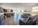 Open living area features a gourmet kitchen, dining space, and comfortable seating area at 340 Autumn Palace Ct, Las Vegas, NV 89144