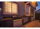 Exterior shot showcasing a built-in grill and counterspace is perfect for outdoor cooking at 340 Autumn Palace Ct, Las Vegas, NV 89144