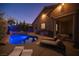 Outdoor patio with pool, barbecue, and lounge chairs, perfect for relaxing and entertaining at 340 Autumn Palace Ct, Las Vegas, NV 89144