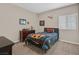 Cozy bedroom featuring decor, furniture, and a window at 404 Lost Horizon Ave, Henderson, NV 89002